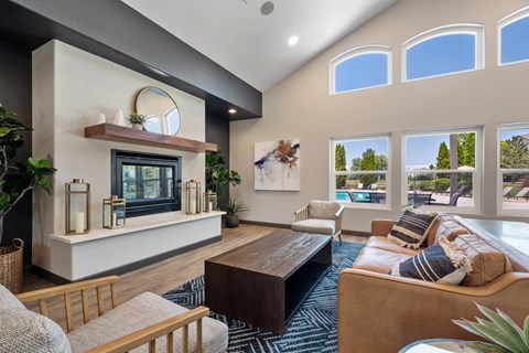 a living room with a couch and a fireplace